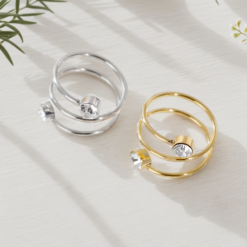 Carnival Stainless Steel Twisted Band Ring with Sparkling Artificial Stone